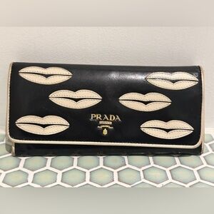 Prada Black Leather Trifold Continental Wallet with White Lip Appliques